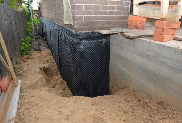 Happy homeowners after waterproofing job in Pickerington